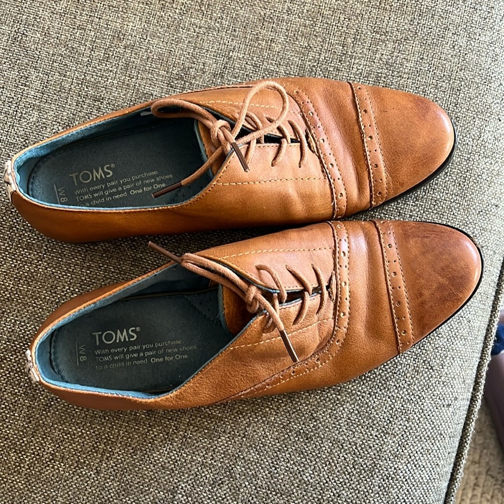 Tom’s tie loafers. Leather not worn much .